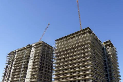 Construction of a building. Construction site with crane. Business, development Stock Photos