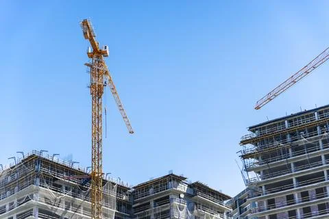 Construction of a building. Construction site with crane. Business, development Stock Photos