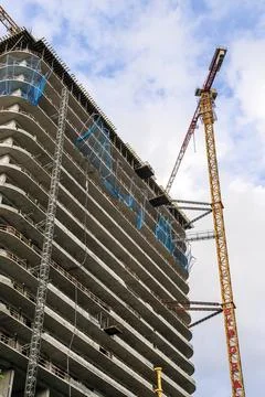 Construction of a building. Construction site with crane. Business, development Stock Photos