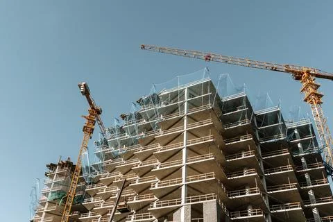 Construction of a building. Construction site with crane. Business, development 写真素材