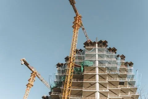Construction of a building. Construction site with crane. Business, development Stock Photos