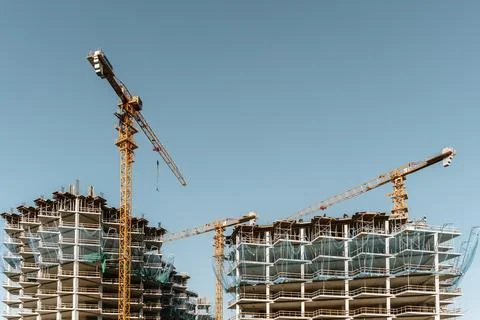 Construction of a building. Construction site with crane. Business, development 写真素材
