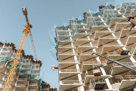 Construction of a building. Construction site with crane. Business, development Fotos de archivo