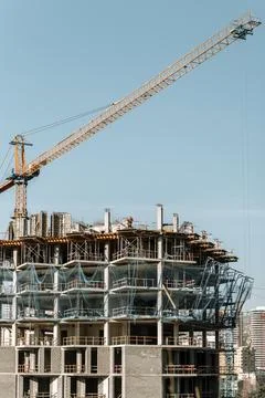 Construction of a building. Construction site with crane. Business, development 写真素材