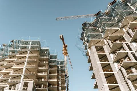 Construction of a building. Construction site with crane. Business, development Stock Photos