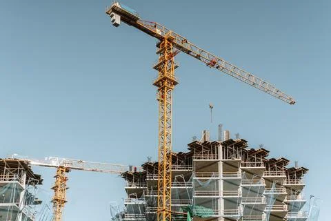 Construction of a building. Construction site with crane. Business, development 写真素材