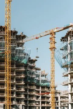 Construction of a building. Construction site with crane. Business, development 写真素材