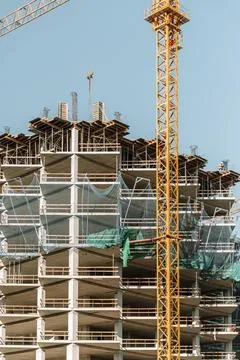 Construction of a building. Construction site with crane. Business, development 写真素材