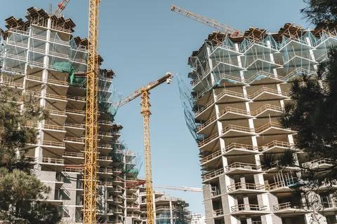 Construction of a building. Construction site with crane. Business, development 写真素材