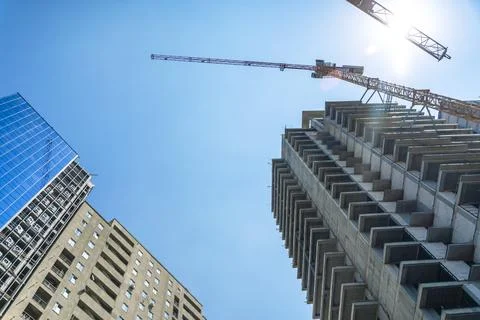 Construction of a building. Construction site with crane. Business, development Stock Photos