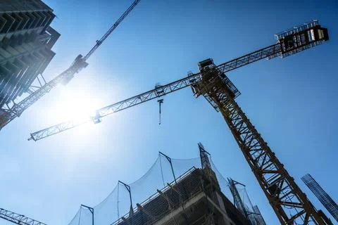 Construction of a building. Construction site with crane. Business, development Stock Photos