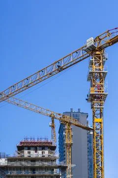 Construction of a building. Construction site with crane. Business, development Stock Photos
