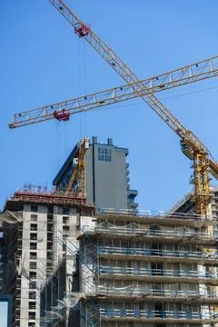 Construction of a building. Construction site with crane. Business, development Stock Photos