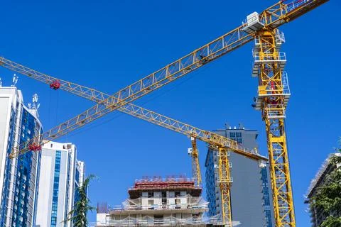 Construction of a building. Construction site with crane. Business, development 写真素材