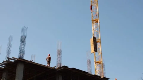 Construction. Building. Crane. Stockbeeldmateriaal 49992419