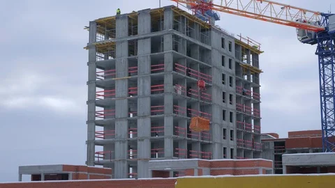 Construction of building with high crane Video stock 124825531