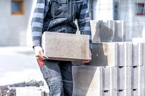 Construction of a building made of concrete bricks Foto stock