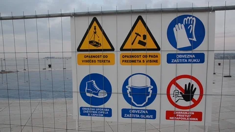 Construction building site safety and warning sign. Health safety warning signs Stock Footage 100682702