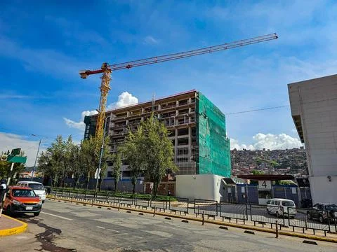 Construction of building with Tower Crane Stock Photos