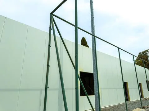 Construction of a building wall frame using metal supports with open sectio.. Stock Photos