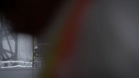 Construction building window reflections with workers Stock Footage 81227782