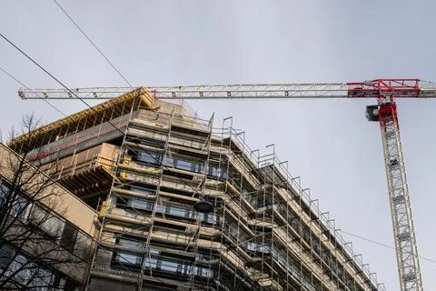 Construction building work on road side with blue sky. 06.04.2023 vienna, a.. Stock Photos