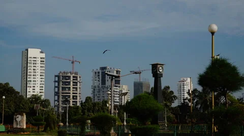 Construction of buildings overlooking on garden. Stock-Footage 65512179