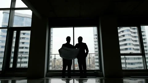 Construction business: two mans with blueprint Stock Footage 87770620