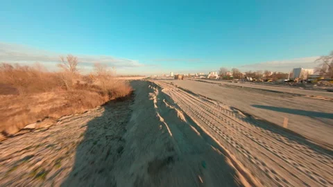 Construction of a bypass road in the suburbs of the metropolis. Aerial view Stock Footage 164968364