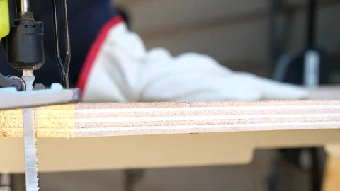 Construction carpenter worker using saws and power tools to get the job done Vidéo 279860452