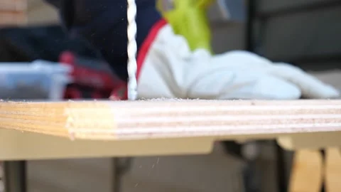 Construction carpenter worker using saws and power tools to get the job done Vidéo 279860490