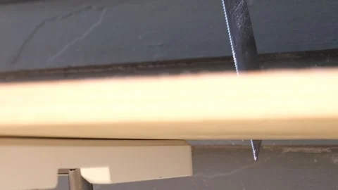 Construction carpenter worker using saws and power tools to get the job done Vidéo 279860518