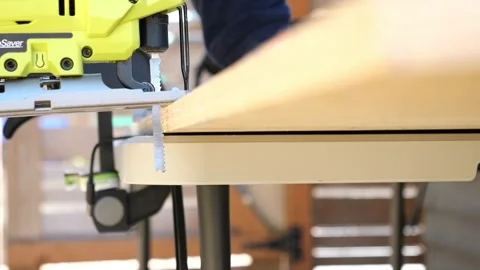 Construction carpenter worker using saws and power tools to get the job done Видео 279860520