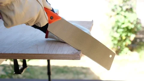 Construction carpenter worker using saws and power tools to get the job done Vidéo 279860521