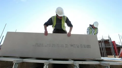 Construction. Carpenter working on construction site. Video stock 8995973