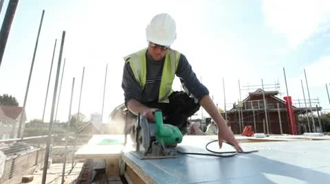 Construction. Carpenter working on construction site. Video stock 8996147
