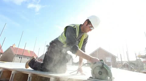 Construction. Carpenter working on construction site. Video stock 8996174