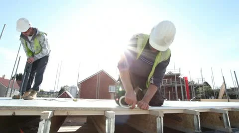 Construction. Carpenter working on construction site. Stock Footage