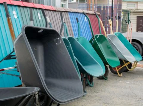 Construction carts of different colors Stock Photos