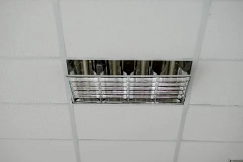 The construction of the ceiling, a broken Ceiling lamp Stock Photos