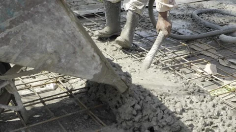 Construction - Cement Mixing in Progress | The Art of Foundation Building Stock Footage 324026025