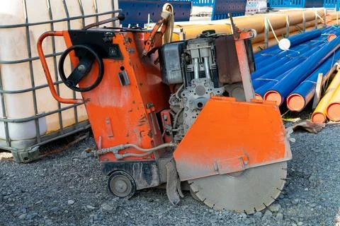 Construction circular machine for cutting material at the construction site. Stock Photos