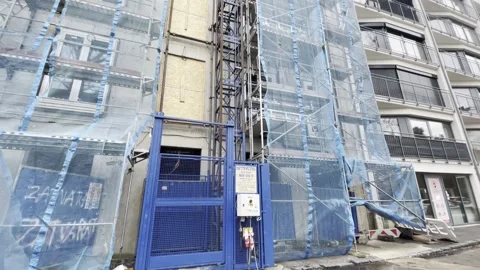 Construction in the city construction elevator Stock Footage 263095033