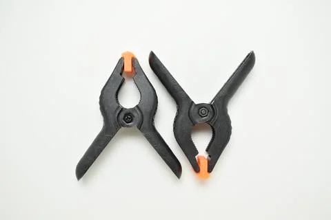 Construction clamps close-up on a white background Stock Photos