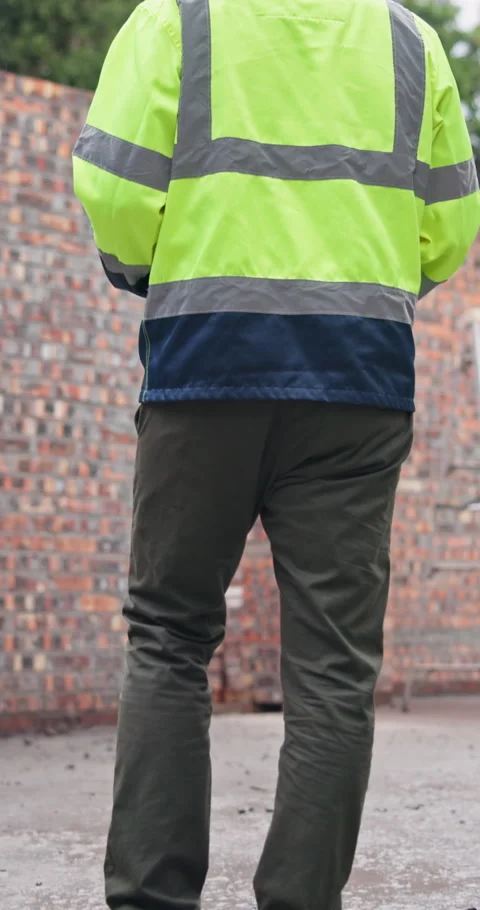 Construction, clipboard and man with walk, site check and quality control for Stock Footage 340983685