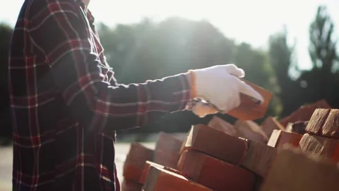 Construction company worker contractor loader unloads a warehouse a bunch of Stock Footage 197359474