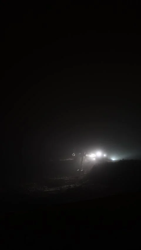 Construction in complete darkness thanks to construction equipment Stock Footage 296543702