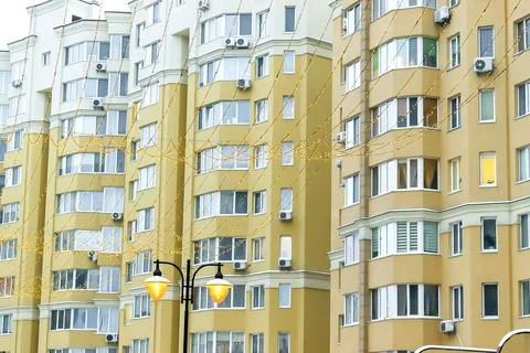 Construction complex with high rise yellow residental apartment buildings wit Stock Photos