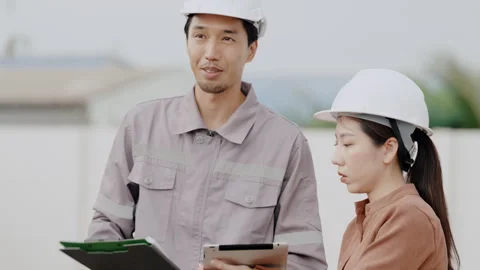 Construction concept of 4k resolution. Engineers are having a construction .. Stock Footage 312700374