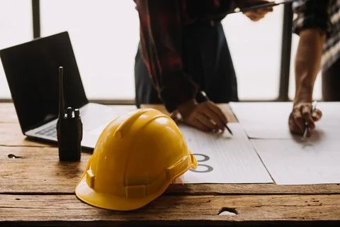 Construction concept of Engineer and Architect working at Construction Site.. Foto stock